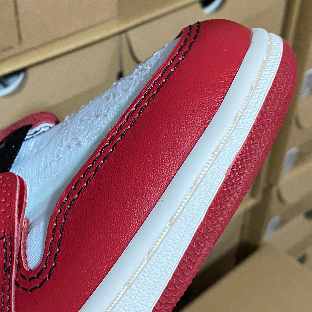 Red high-top sneaker side panel with light blue toe overlay and white midsole
