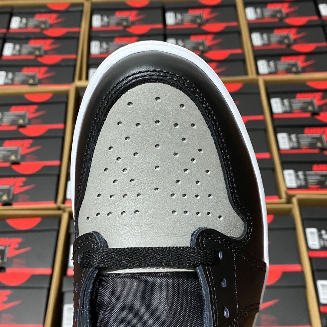 High-top sneaker vamp with perforated toe box and black overlay, light gray panel