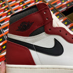 High-top sneaker side detail with AIR JORDAN wing logo and black swoosh.