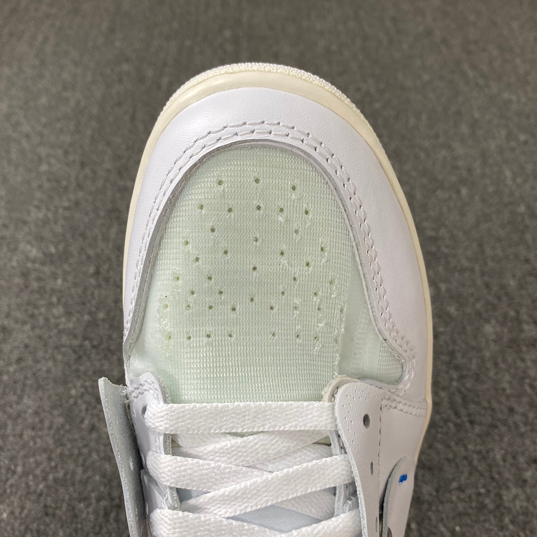 White high-top sneaker with pale green tongue lining and lace-up front