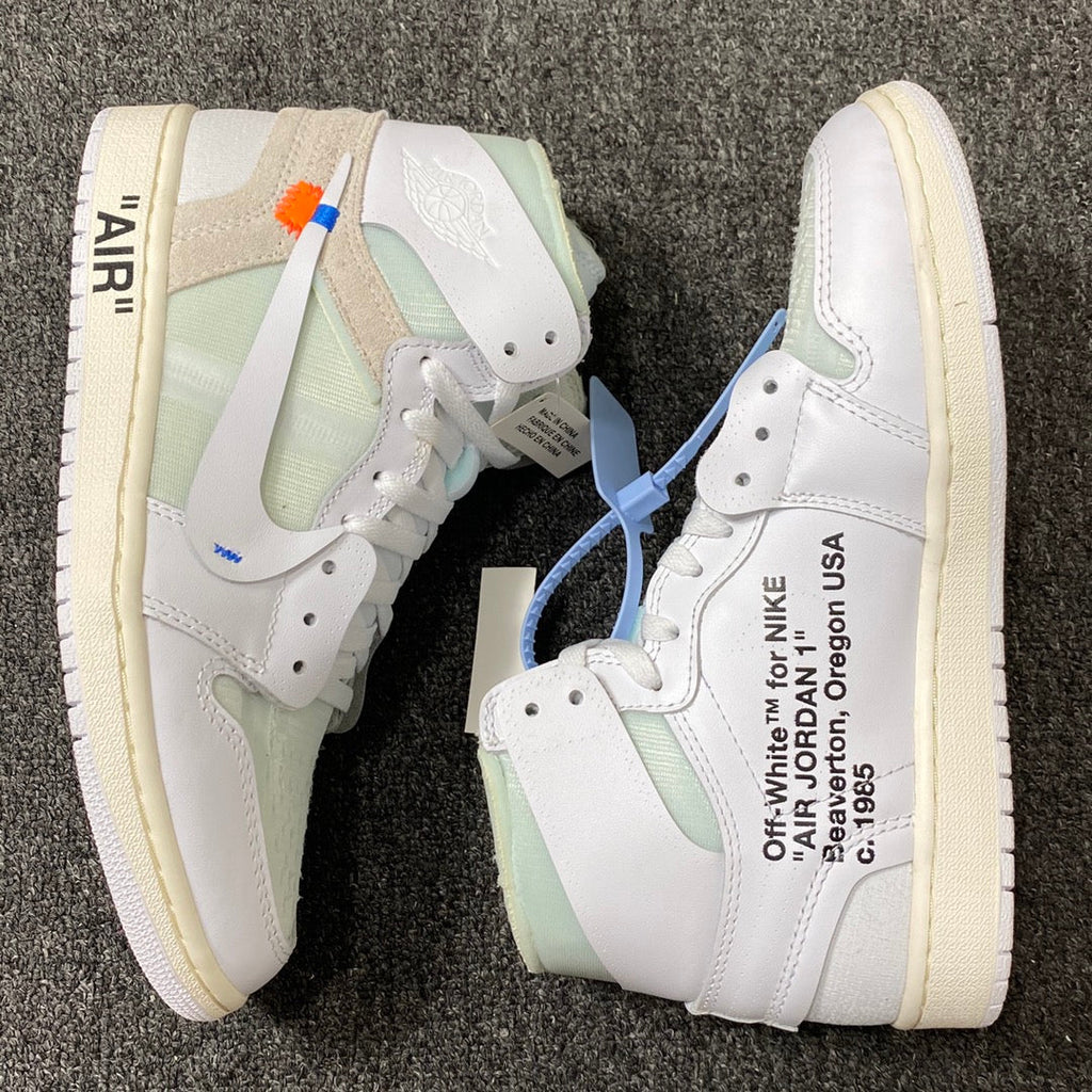 White and pale green high-top sneakers with 'AIR' side detail and cream soles