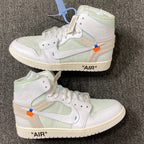 White and pale green high-top sneakers with lace detail and cream midsoles