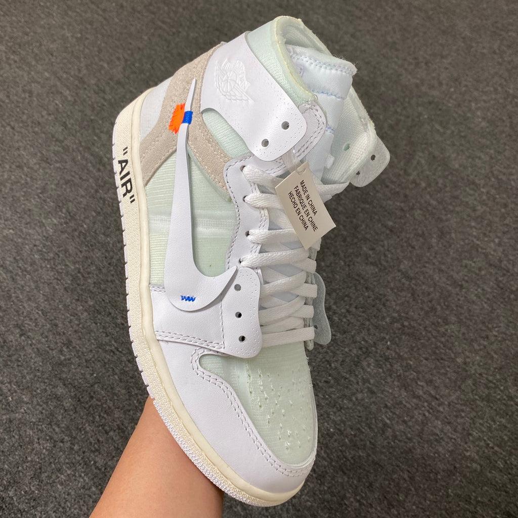 White and pale green high-top sneaker with Swoosh and cream sole