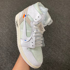 White and pale green high-top sneaker with Swoosh and cream sole
