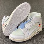 White and pale green high-top sneakers showing tread outsole and Swoosh