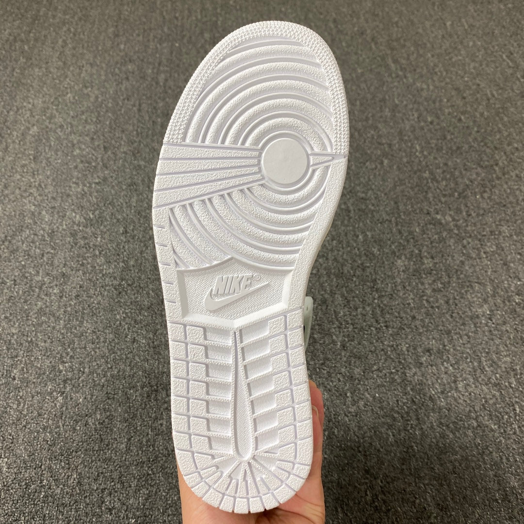 White sneaker outsole with Nike branding and circular traction pattern