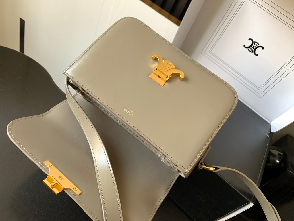 Beige Celine flap shoulder bag with gold-tone logo and crossbody strap