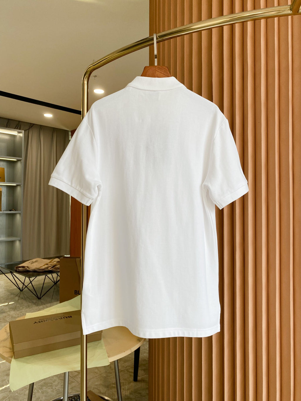 White Burberry polo shirt back view with short sleeves