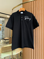 Burberry short-sleeve polo shirt in black with embroidered logo and chest pocket