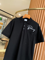 Burberry short-sleeve polo shirt in black with button placket and chest logo