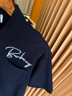 Burberry polo shirt dark navy, embroidered signature logo on chest, side seam hem