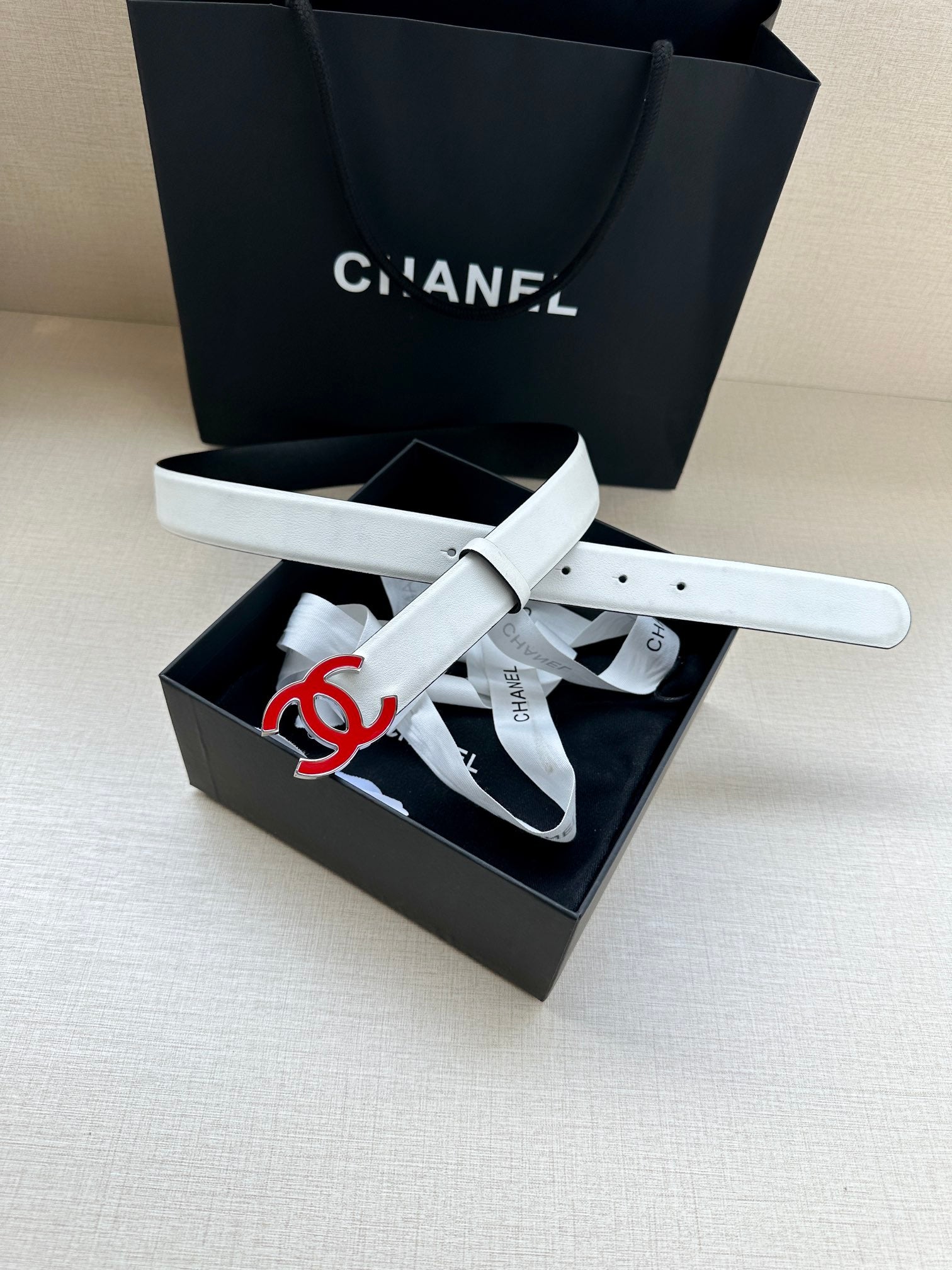 Leather belt with Chanel logo buckle, light cream strap in gift box