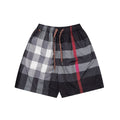 Burberry plaid pants with elastic waist and braided drawstring, dark gray and red stripe
