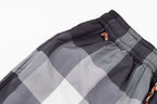 Plaid pants waistband with elastic and braided cord, dark and light gray check