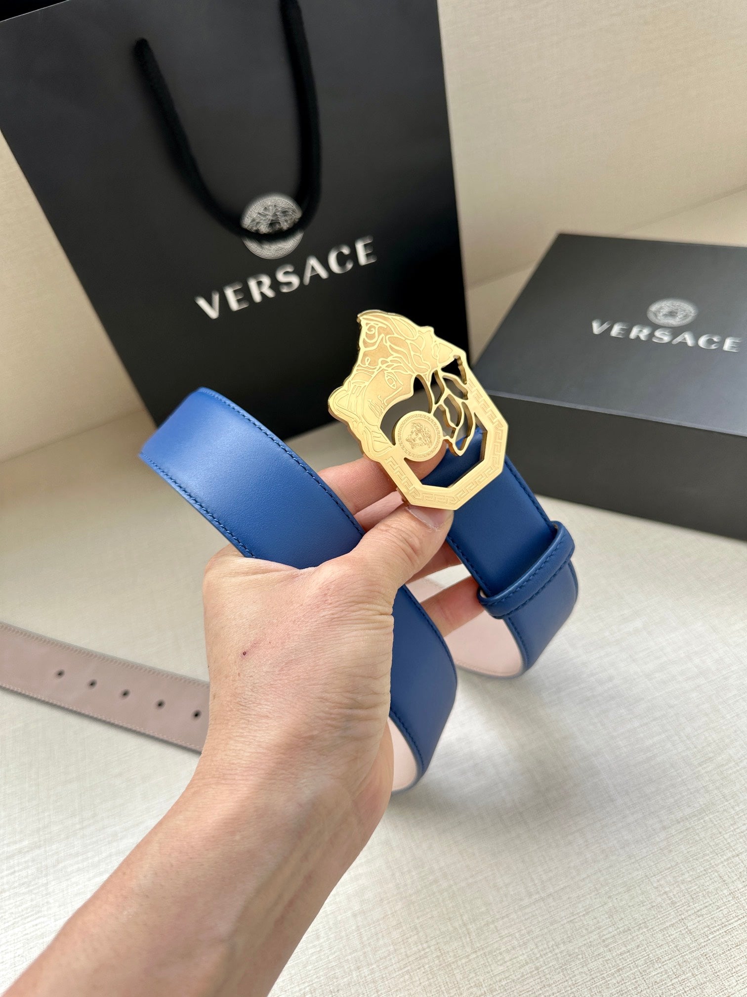 Versace belt, blue strap with gold-toned Medusa buckle and emblem