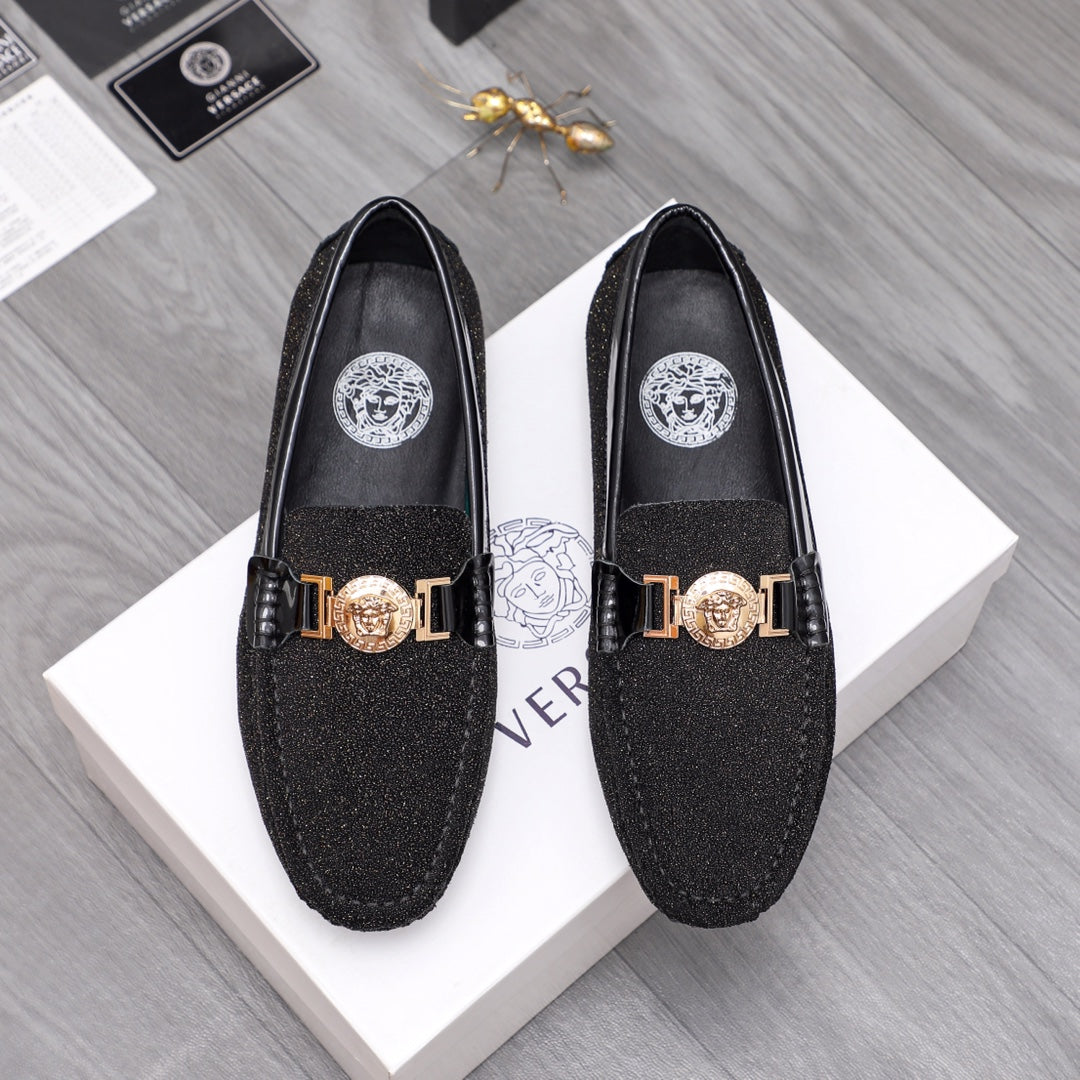 Versace black glitter loafers with gold buckle and crest emblem, pair view