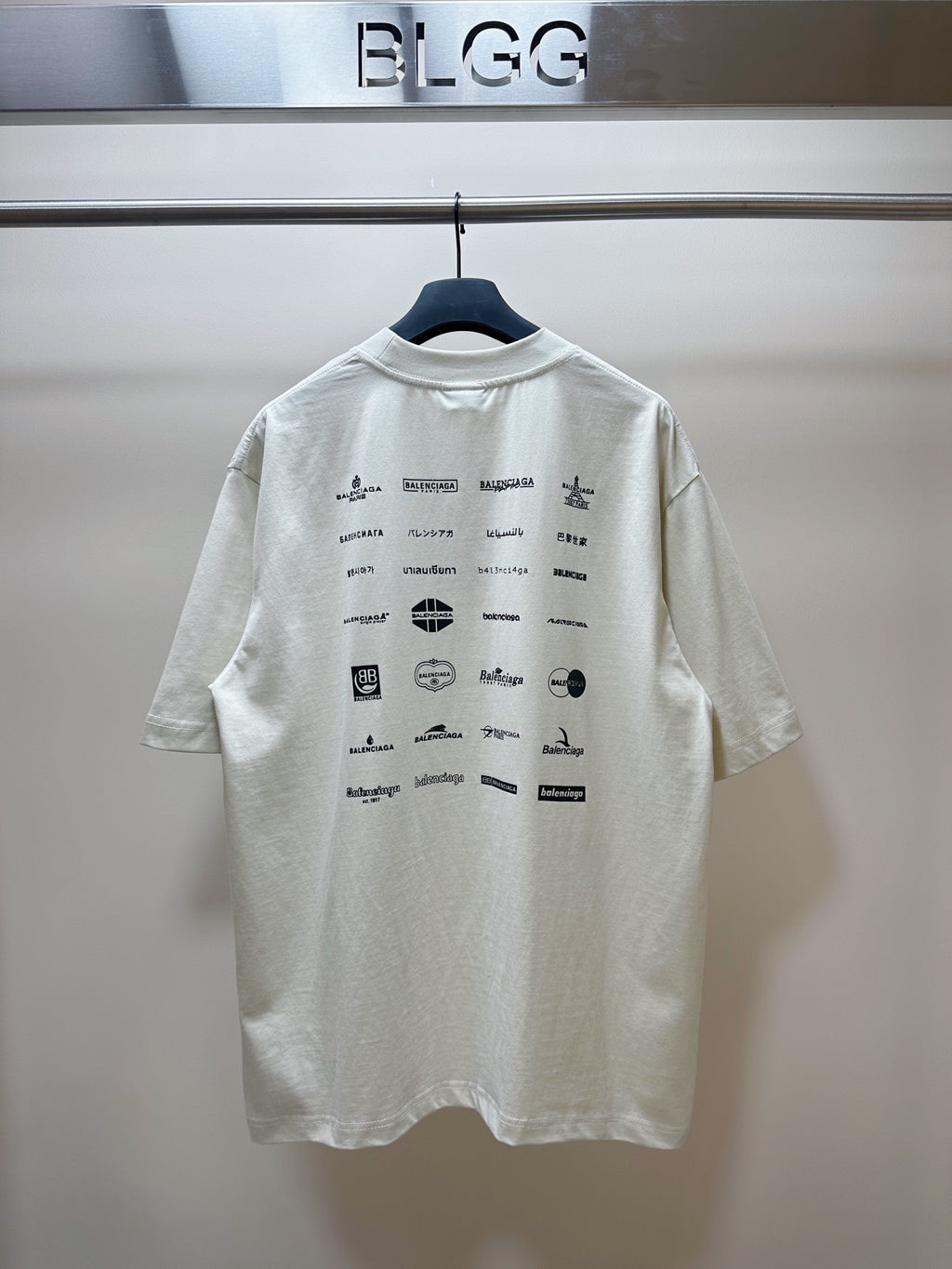 Balenciaga white short-sleeve T-shirt, back with black logo text and symbols