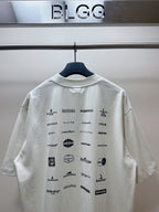 Balenciaga white short-sleeve T-shirt with black logos and icons across the back