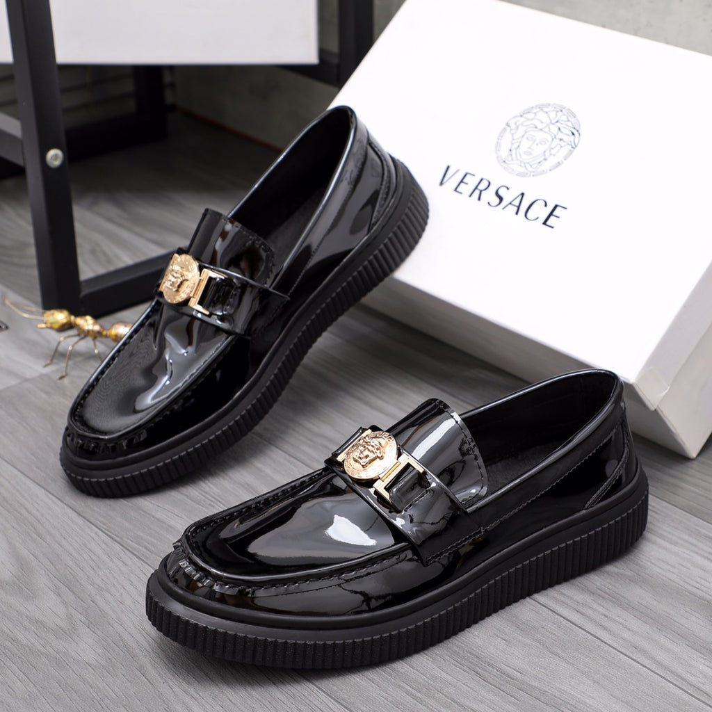 Versace patent leather loafers with gold buckle and chunky black platform sole