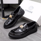 Versace patent leather loafers with gold buckle and chunky black platform sole