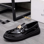 Versace glossy loafers with front strap buckle and thick ribbed platform sole
