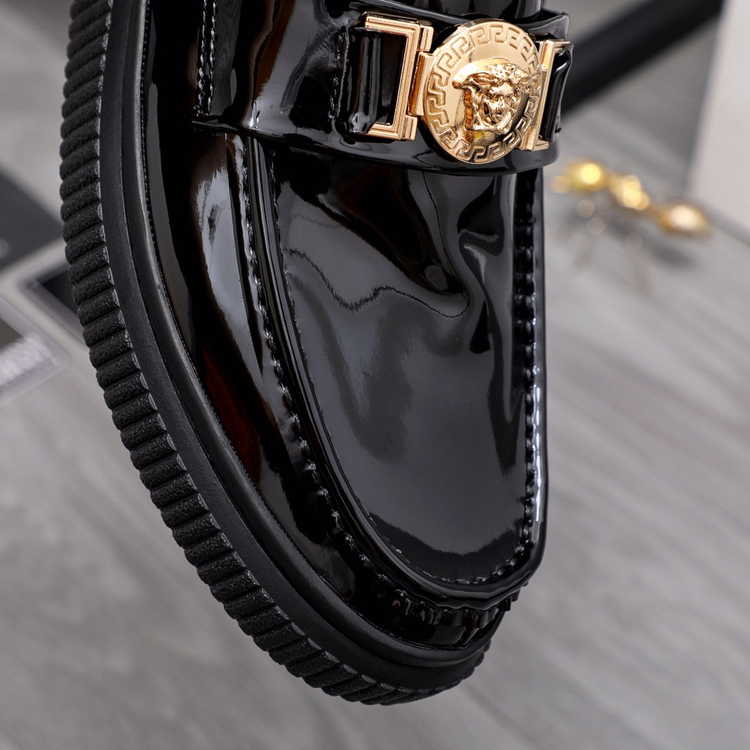 Versace patent loafer with square gold buckle and engraved medallion emblem