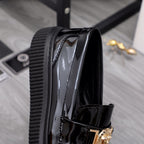 Versace patent loafer side view with ribbed platform edge and gold buckle