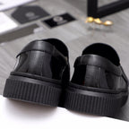 Versace luxury black patent loafers with thick textured platform sole