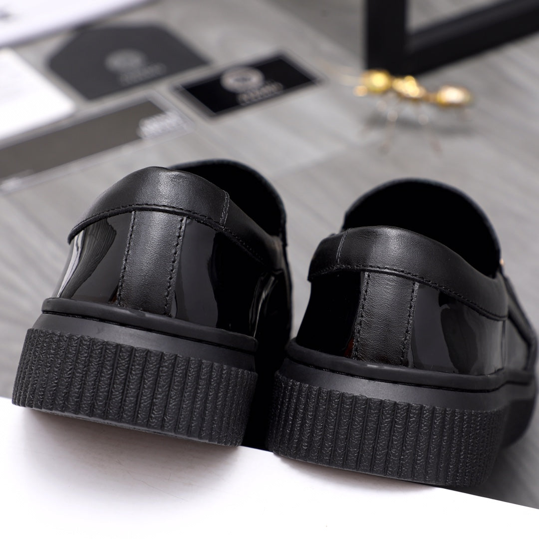 Versace luxury black patent loafers with thick textured platform sole