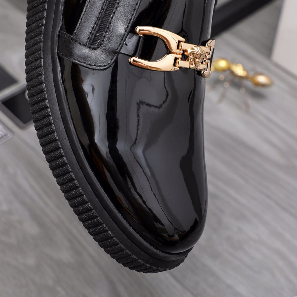 Versace luxury black patent loafer with gold buckle strap detail