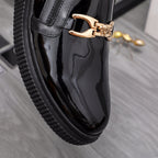 Versace luxury black patent loafer with gold buckle strap detail