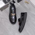 Versace luxury black patent loafers with gold buckle, front and side view