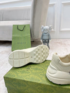Gucci unisex sneaker outsole and side, cream lace-up with chunky tread