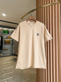 Light beige short-sleeve crewneck T-shirt with small chest logo on hanger