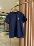 Navy short-sleeve crew-neck T-shirt with small white logo on chest.