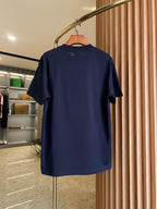 Navy short-sleeve crew-neck T-shirt back view on hanger.
