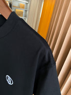 Burberry black T-shirt sleeve with embroidered circular logo