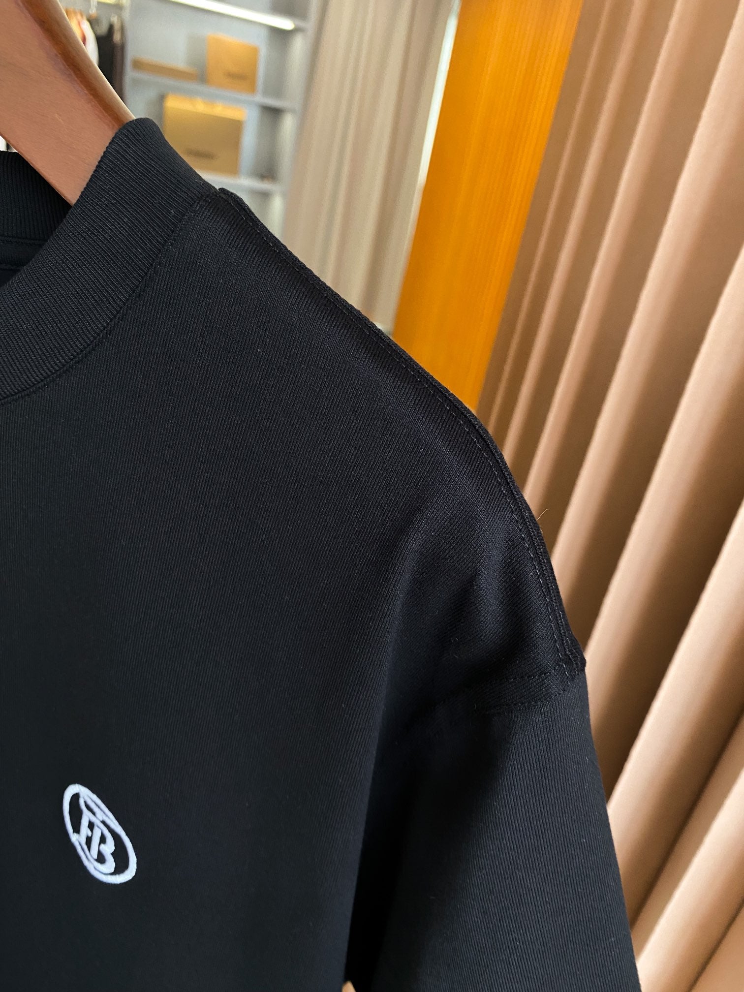 Burberry black T-shirt sleeve with embroidered circular logo
