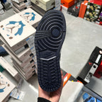 Air Jordan 1 outsole with textured traction pattern and circular emblem