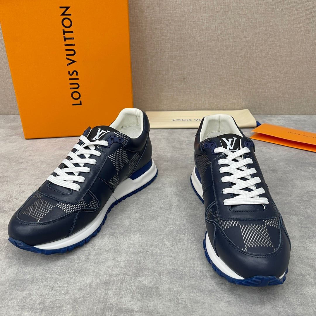 Navy Louis Vuitton low-top sneakers with white laces, diamond pattern and blue trim sole