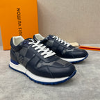 Navy Louis Vuitton low-top sneakers with white laces, patterned panels and blue sole