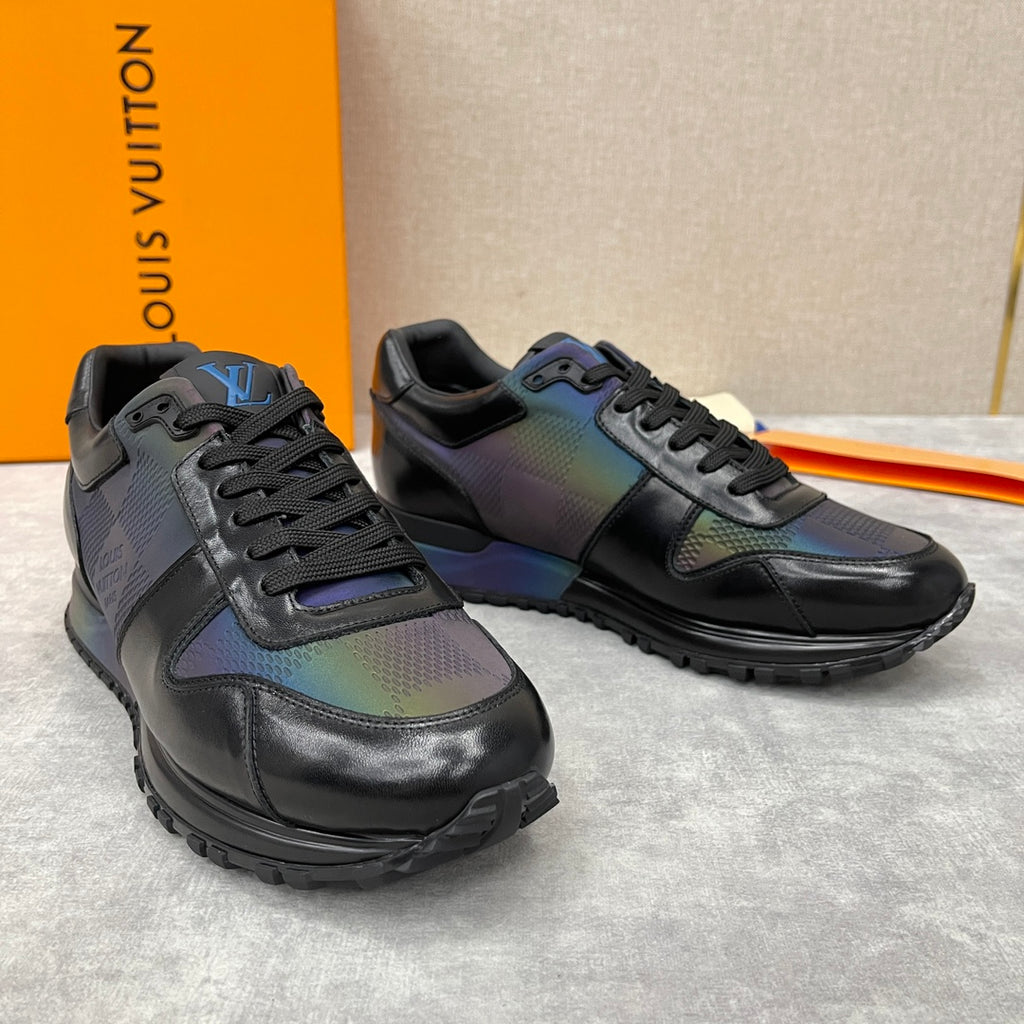Black low-top sneakers with iridescent multicolor panels and lace-up front.