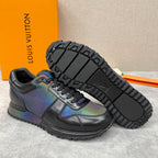 Low-top sneakers with iridescent panels, lace-up front, and textured tread outsole.