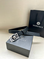 Versace belt with dark strap and silver-tone square lion medallion buckle