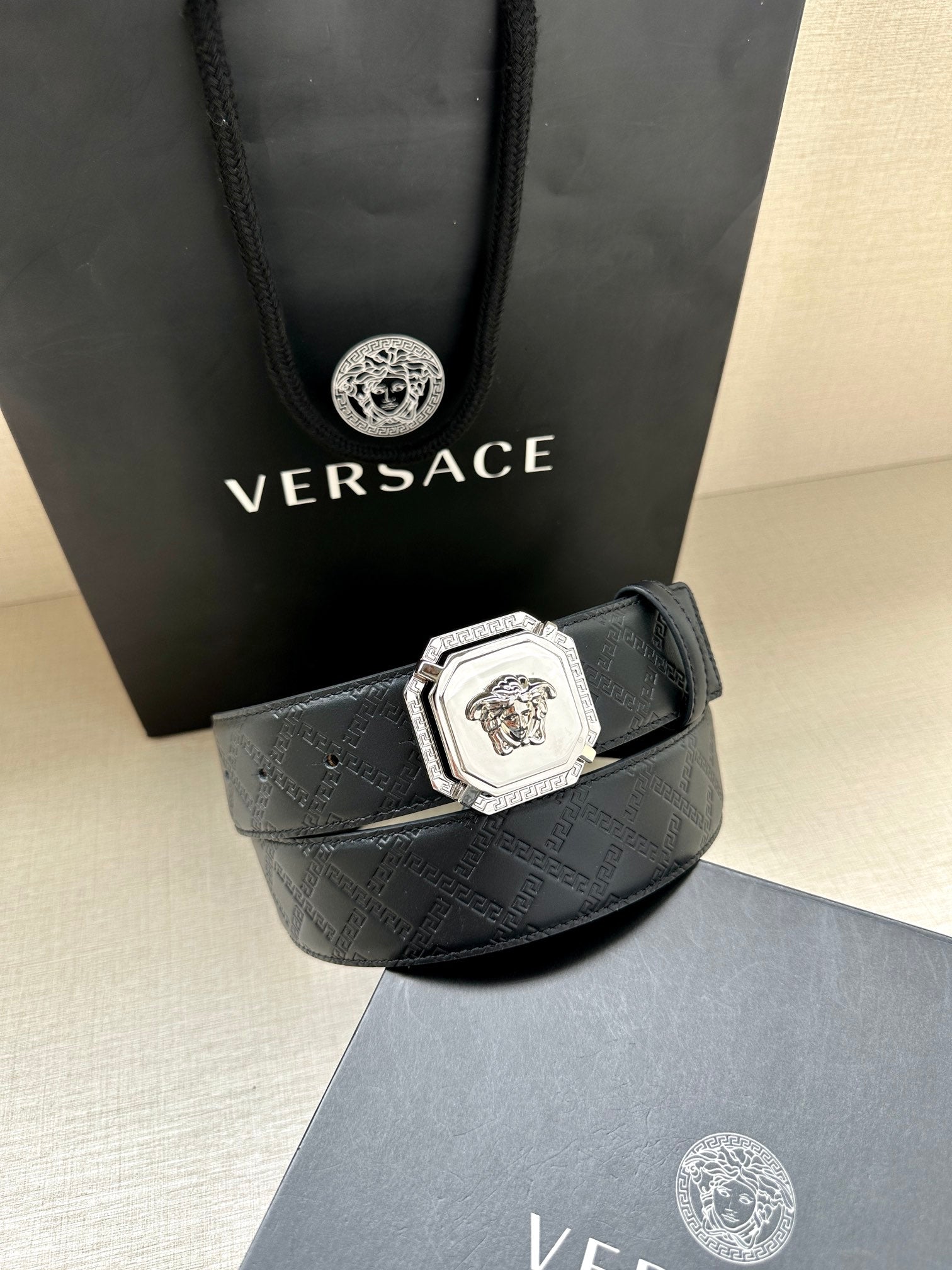 Versace belt, dark patterned leather with silver lion buckle and belt loop