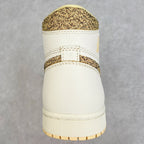 Back view of white high-top sneaker with brown speckled collar and padded heel.