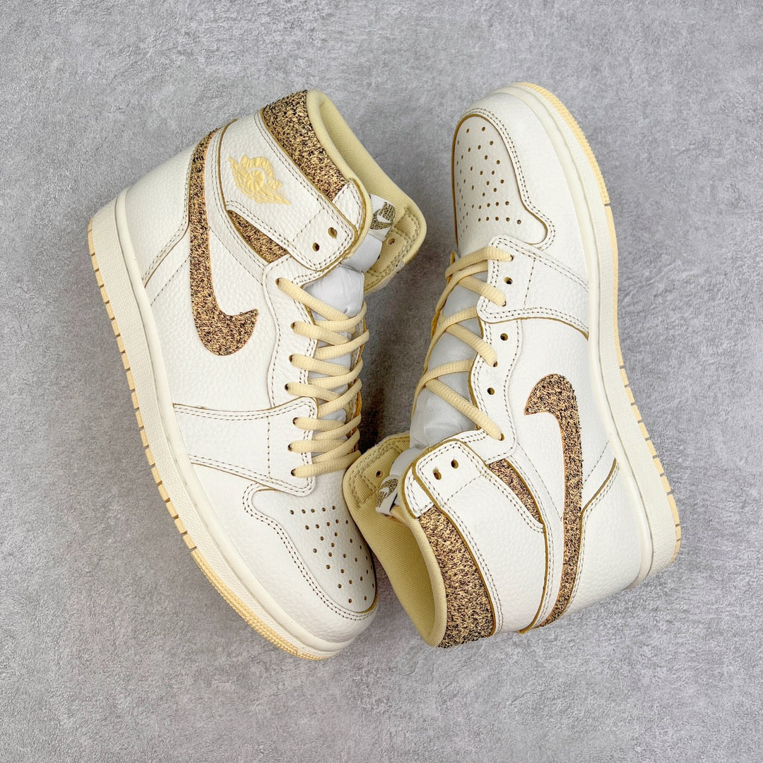 White high-top sneaker with brown speckled swoosh overlays and cream lace-up design.