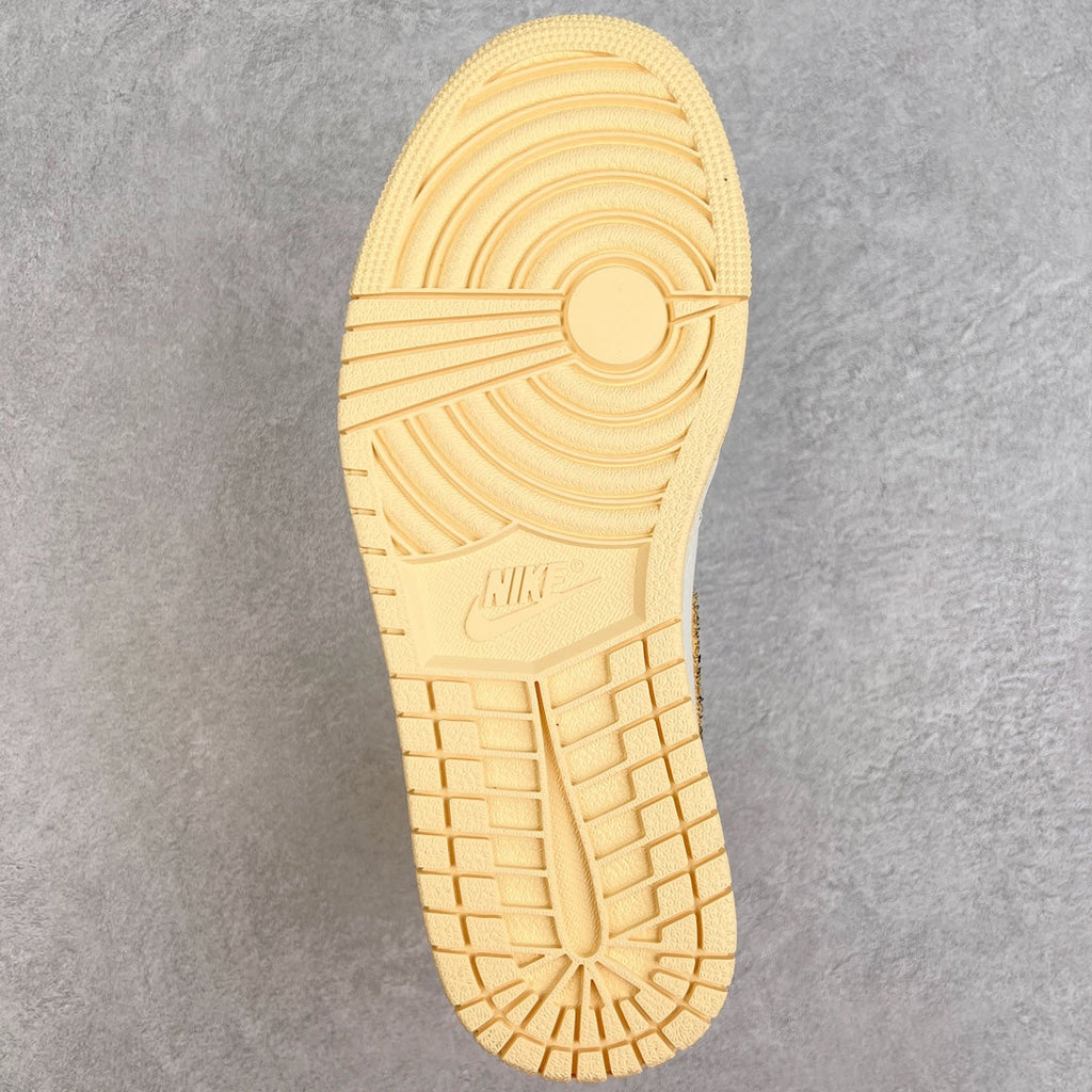 White high-top sneaker outsole with textured traction pattern and circular pivot design.