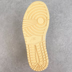 White high-top sneaker outsole with textured traction pattern and circular pivot design.
