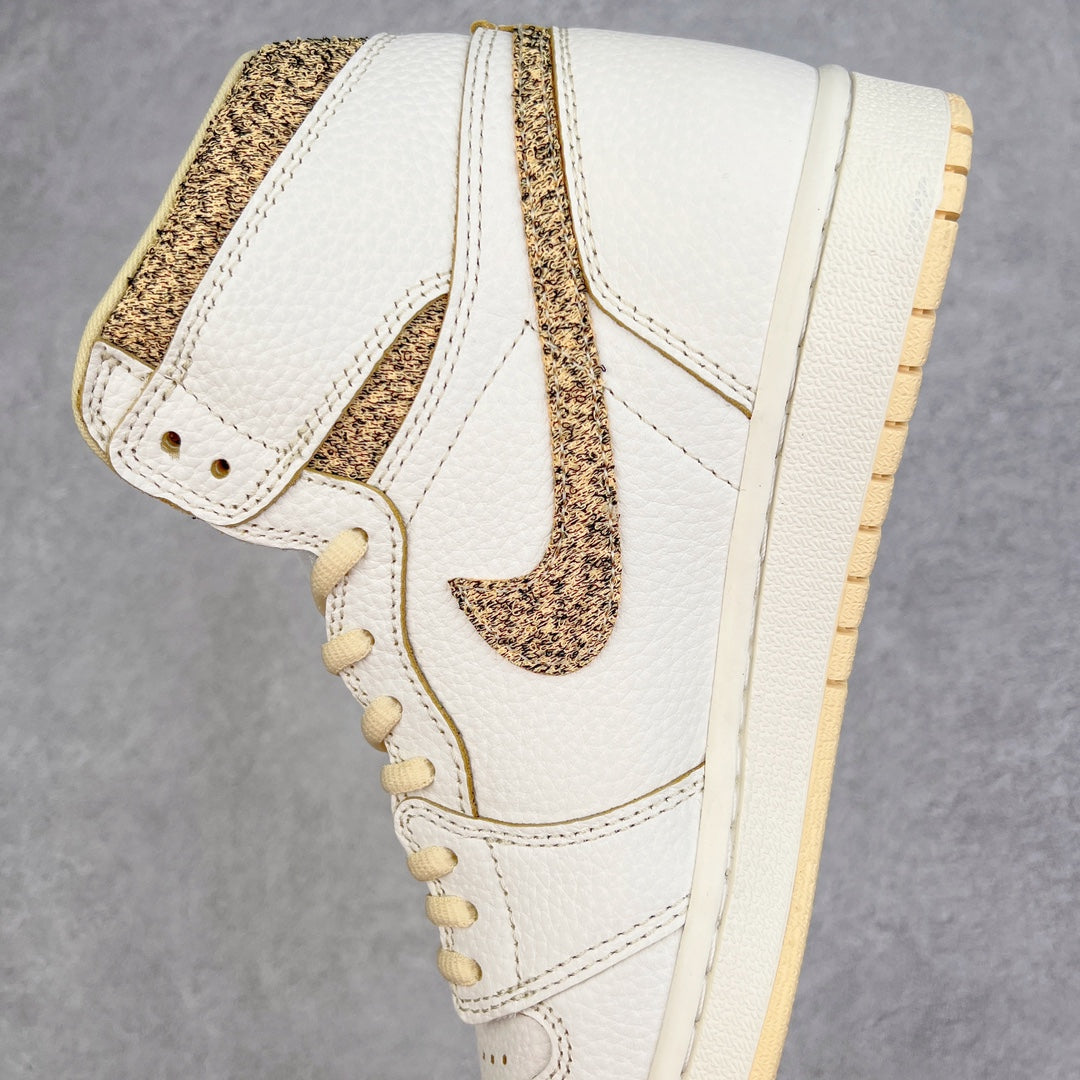 White high-top sneaker showing heel and side panels with brown speckled accents and laces.